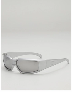 Side view of silver futuristic wrap-around sports sunglasses with a sleek Y2K metallic frame