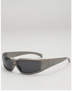 Close-up of futuristic silver streamlined frame with dark lenses on sporty Y2K sunglasses