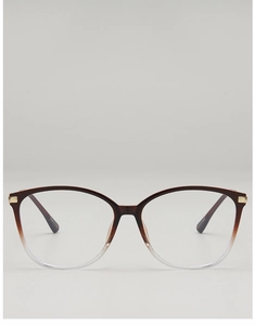 Close-up of brown gradient eyeglass frames with elegant gold metal temple hinges