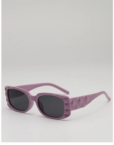Detail of lavender geometric faceted sunglasses frame with dark lenses and modern style