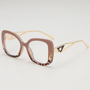 Oversized square glasses with brown leopard frame and golden triangle heart metal temples