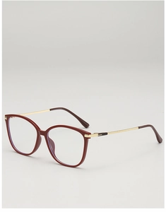 Detail of burgundy large frame glasses with slim gold metal temples and blue light lenses
