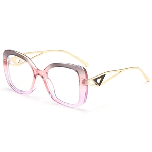 Fashionable oversized gradient pink frame glasses with metal heart-accented temples
