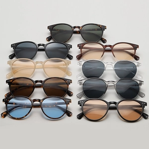 Sammlung von runden Retro-Sonnenbrillen in neun verschiedenen Farben für Damen und Herren
