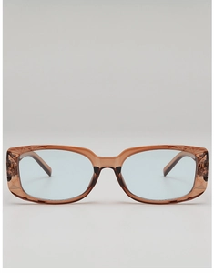 Detail of square sunglasses with translucent brown diamond-cut frames and blue lenses