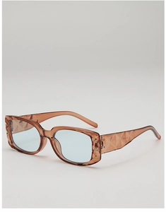Detailed view of translucent brown rectangular sunglasses with embossed geometric textures