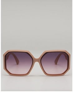 Detail of trendy polygonal oversized sunglasses featuring hollowed-out letter temples