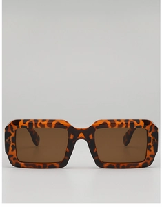 Detail showing the leopard print square frame and brown lenses of these stylish sunglasses