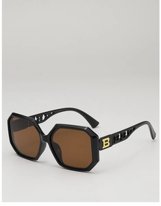 Macro detail of polygon sunglasses with hollow B-letter gold logo on temple