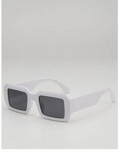 Detail view of white rectangular sunglasses with thick temples and dark lenses