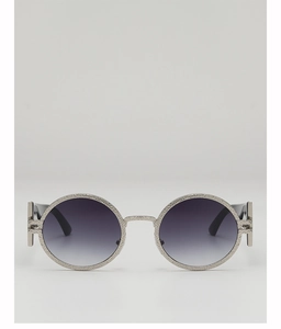 Detail of silver round frame sunglasses with hammered texture and gradient lenses