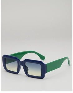 Close-up of rectangular blue and green sunglasses with gradient ocean tinted lenses
