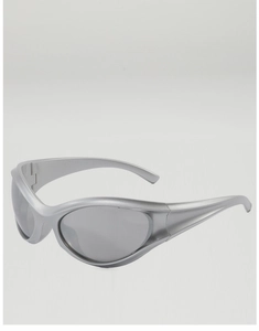 Detail of silver Y2K wraparound sunglasses featuring matte frame and grey lenses