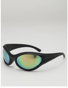 Close-up of Y2K punk sunglasses with matte black frames and green-gold mirrored lenses