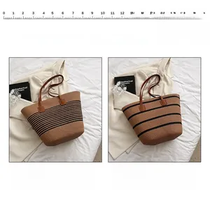 Comparison detail of thin and thick black striped straw tote bags with leather handles