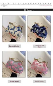 Detailed view of four retro jacquard hand bags with butterfly patterns and metal handles