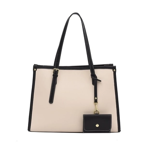 Sac fourre-tout beige minimaliste avec bordure noire et bandoulière amovible pour le bureau