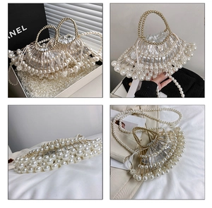 Detail view of handmade pearl beaded handbag with silver drawstring inner pouch