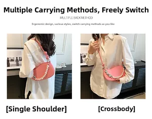 Pink semi-circle crossbody bag featuring decorative pearl and heart chain details