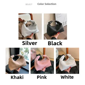 Selection of pleated handbags in silver, black, khaki, pink, and white leather styles
