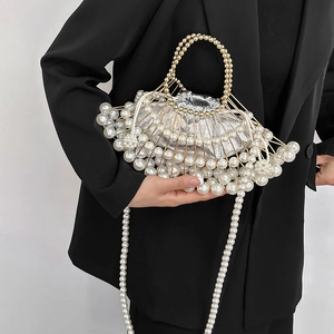 Luxury fan-shaped handmade pearl handbag with silver drawstring liner for women