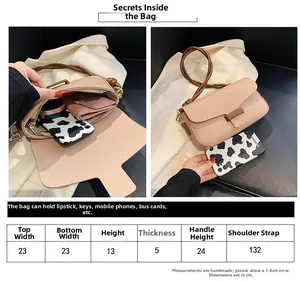 Detailed size chart and internal capacity view of the minimalist pink shoulder handbag