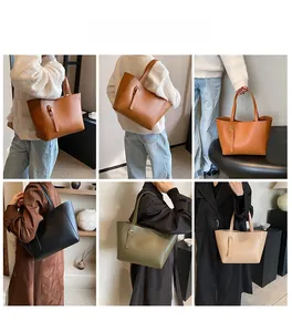 Sacs cabas spacieux en cuir grainé marron, noir, olive et beige portés par un mannequin
