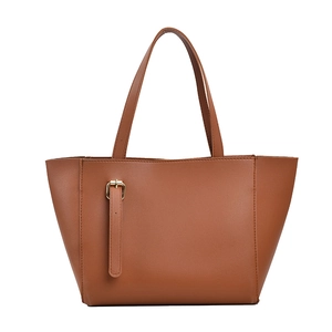 Sac cabas minimaliste en cuir marron caramel avec boucle décorative et poignées