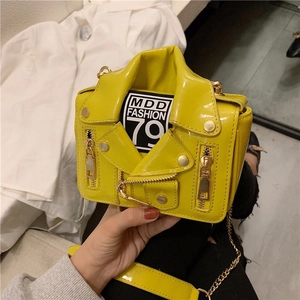 Edgy yellow motorcycle jacket shaped crossbody bag in glossy patent leather finish