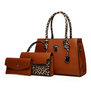 Brown faux leather tote bag set with leopard print accents and decorative metal lock