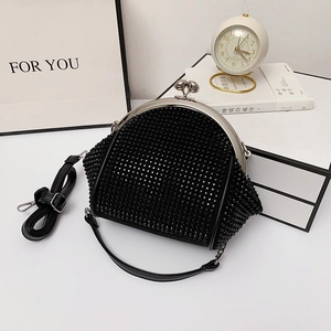 Elegant black rhinestone frame clutch bag with metal clasp and slender shoulder strap