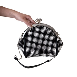 Elegant black rhinestone evening handbag with silver frame and sparkling crystal mesh