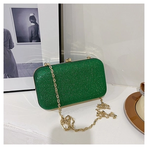 Sparkling green sequin evening clutch bag with gold chain strap for elegant parties