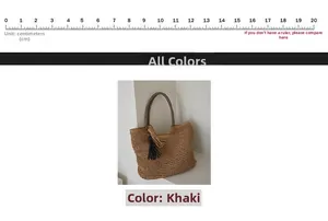 Detailed macro view of khaki woven straw tote bag featuring decorative fringe and striped handle