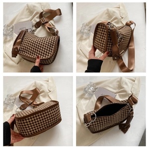 Detailed views of a houndstooth crossbody bag with brown leather trim and wide strap