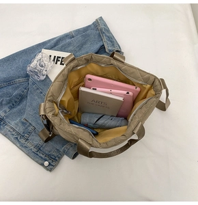 Spacious quilted tote bag interior view with large capacity for daily essentials