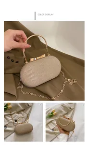 Detailed macro view of the gold sequined evening clutch bag with butterfly clasp