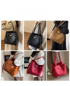 Detail showing the adjustable leather strap and metallic twist lock on various color bags