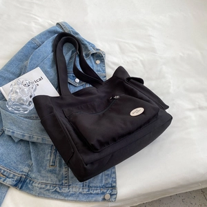 Casual black canvas tote bag with good luck embroidery and large zipper pocket
