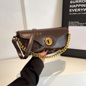 Brown oil wax leather mini square bag with chunky gold chain and metallic buckle