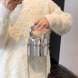 Silver mirror cylindrical handbag with large metal handle and slim chain strap for women