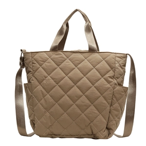 Brown quilted nylon tote bag with rhombus pattern, dual handles, and wide shoulder strap