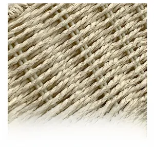 Macro view of tight diagonal weave texture on a beige French retro straw shoulder bag