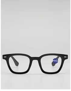 Detail of +1.00 anti-blue light reading glasses with silver diamond rivets on black frames