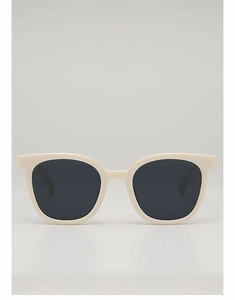Close-up of cream square frame sunglasses with dark lenses for a retro fashion style