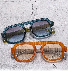 Vue macro de lunettes aviateur rétro avec montures texturées et verres dégradés teintés