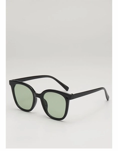 Side view of square black frame sunglasses with mint green lenses in minimalist style
