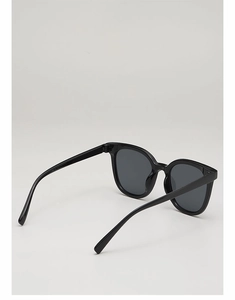 Detail view of black square frame sunglasses with sleek temples and polished finish