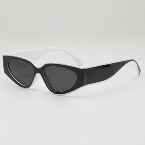 Lunettes de soleil œil de chat rétro avec monture contrastée noir et blanc tendance