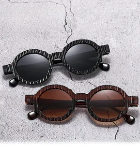 Detail of vintage round sunglasses with unique vertical ribbed texture on frames